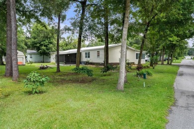 Charming 3-bedroom, 2-bathroom home, perfectly situated on a on Rivard Golf and Country Club in Florida - for sale on GolfHomes.com, golf home, golf lot