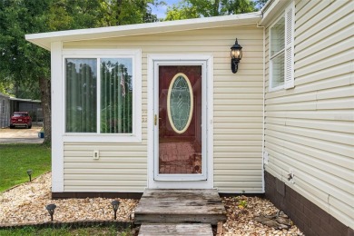 Charming 3-bedroom, 2-bathroom home, perfectly situated on a on Rivard Golf and Country Club in Florida - for sale on GolfHomes.com, golf home, golf lot