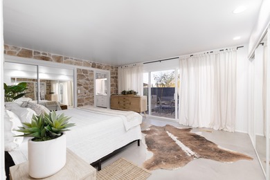 Welcome to a striking transformation of mid-century modern on Bloomington Country Club in Utah - for sale on GolfHomes.com, golf home, golf lot