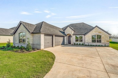Welcome to this brand-new home by Al Couto Homes, located in the on Nutcracker Golf Club in Texas - for sale on GolfHomes.com, golf home, golf lot