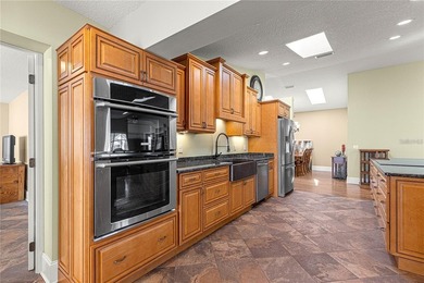 This home is located in the much sought after 55+ golf community on On Top of the World Golf Course in Florida - for sale on GolfHomes.com, golf home, golf lot