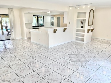 Vacation Rental or Personal Paradise! Investor-ready luxurious on Royal Tee Country Club in Florida - for sale on GolfHomes.com, golf home, golf lot