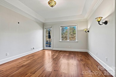 Discover *The Abbey* at Cowans Ford Golf, Tennis & Pickleball on Cowans Ford Country Club in North Carolina - for sale on GolfHomes.com, golf home, golf lot