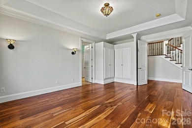 Discover *The Abbey* at Cowans Ford Golf, Tennis & Pickleball on Cowans Ford Country Club in North Carolina - for sale on GolfHomes.com, golf home, golf lot