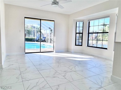 Vacation Rental or Personal Paradise! Investor-ready luxurious on Royal Tee Country Club in Florida - for sale on GolfHomes.com, golf home, golf lot