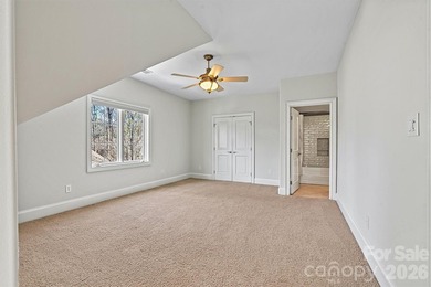 Discover *The Abbey* at Cowans Ford Golf, Tennis & Pickleball on Cowans Ford Country Club in North Carolina - for sale on GolfHomes.com, golf home, golf lot