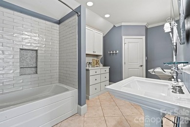 Discover *The Abbey* at Cowans Ford Golf, Tennis & Pickleball on Cowans Ford Country Club in North Carolina - for sale on GolfHomes.com, golf home, golf lot