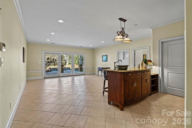 Discover *The Abbey* at Cowans Ford Golf, Tennis & Pickleball on Cowans Ford Country Club in North Carolina - for sale on GolfHomes.com, golf home, golf lot