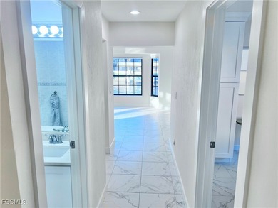 Vacation Rental or Personal Paradise! Investor-ready luxurious on Royal Tee Country Club in Florida - for sale on GolfHomes.com, golf home, golf lot