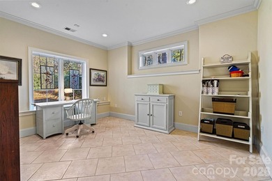 Discover *The Abbey* at Cowans Ford Golf, Tennis & Pickleball on Cowans Ford Country Club in North Carolina - for sale on GolfHomes.com, golf home, golf lot