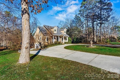 Discover *The Abbey* at Cowans Ford Golf, Tennis & Pickleball on Cowans Ford Country Club in North Carolina - for sale on GolfHomes.com, golf home, golf lot