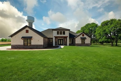 This exceptional 4-bedroom, 3.5-bath luxury modern farmhouse on Nutcracker Golf Club in Texas - for sale on GolfHomes.com, golf home, golf lot