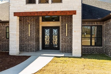 This exceptional 4-bedroom, 3.5-bath luxury modern farmhouse on Nutcracker Golf Club in Texas - for sale on GolfHomes.com, golf home, golf lot