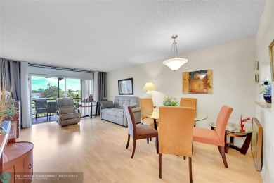 Beautiful, turn key, top corner condo, fully furnished located on Sunrise Lakes Phase III in Florida - for sale on GolfHomes.com, golf home, golf lot