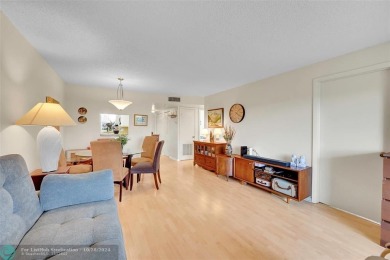 Beautiful, turn key, top corner condo, fully furnished located on Sunrise Lakes Phase III in Florida - for sale on GolfHomes.com, golf home, golf lot
