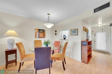 Beautiful, turn key, top corner condo, fully furnished located on Sunrise Lakes Phase III in Florida - for sale on GolfHomes.com, golf home, golf lot