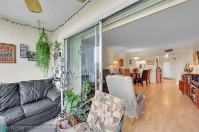 Beautiful, turn key, top corner condo, fully furnished located on Sunrise Lakes Phase III in Florida - for sale on GolfHomes.com, golf home, golf lot