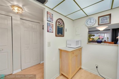 Beautiful, turn key, top corner condo, fully furnished located on Sunrise Lakes Phase III in Florida - for sale on GolfHomes.com, golf home, golf lot