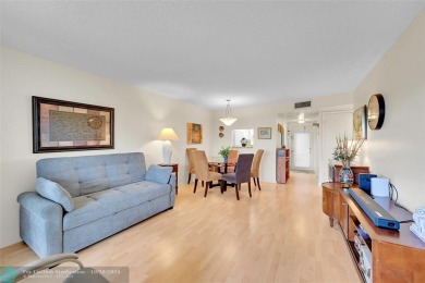 Beautiful, turn key, top corner condo, fully furnished located on Sunrise Lakes Phase III in Florida - for sale on GolfHomes.com, golf home, golf lot