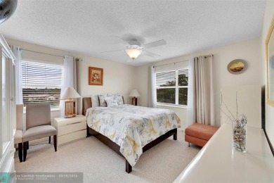 Beautiful, turn key, top corner condo, fully furnished located on Sunrise Lakes Phase III in Florida - for sale on GolfHomes.com, golf home, golf lot