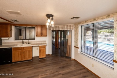 Welcome to your new Lake Havasu retreat! This beautiful on London Bridge Golf Course in Arizona - for sale on GolfHomes.com, golf home, golf lot