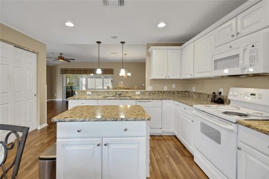 A MUST SEE! This lovely Challedon model BLOCK/STUCCO home in on Eagle Ridge At Spruce Creek Country Club in Florida - for sale on GolfHomes.com, golf home, golf lot
