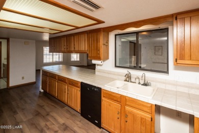 Welcome to your new Lake Havasu retreat! This beautiful on London Bridge Golf Course in Arizona - for sale on GolfHomes.com, golf home, golf lot