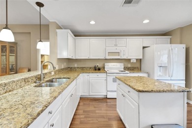 A MUST SEE! This lovely Challedon model BLOCK/STUCCO home in on Eagle Ridge At Spruce Creek Country Club in Florida - for sale on GolfHomes.com, golf home, golf lot