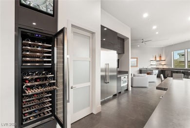 Located on a double-gated street in the prestigious MacDonald on Dragon Ridge Country Club in Nevada - for sale on GolfHomes.com, golf home, golf lot