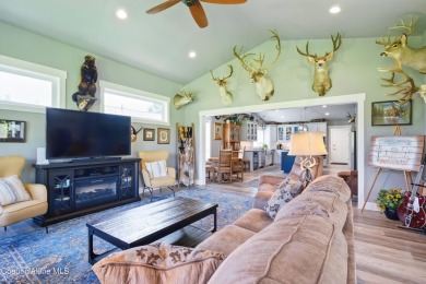 Experience resort-style living on the 18th fairway of Twin Lakes on Twin Lakes Village Golf Course in Idaho - for sale on GolfHomes.com, golf home, golf lot