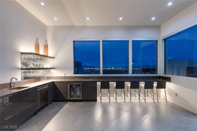 Located on a double-gated street in the prestigious MacDonald on Dragon Ridge Country Club in Nevada - for sale on GolfHomes.com, golf home, golf lot