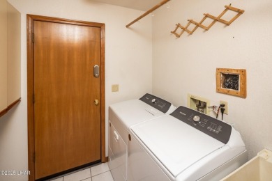 Welcome to your new Lake Havasu retreat! This beautiful on London Bridge Golf Course in Arizona - for sale on GolfHomes.com, golf home, golf lot