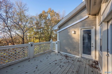 This move-in ready end unit offers privacy and double balconies on Becky Peirce Municipal Golf Course in Alabama - for sale on GolfHomes.com, golf home, golf lot