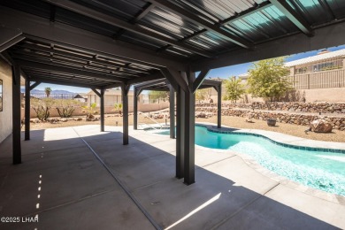 Welcome to your new Lake Havasu retreat! This beautiful on London Bridge Golf Course in Arizona - for sale on GolfHomes.com, golf home, golf lot