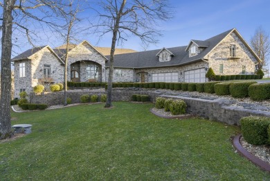 Welcome to your dream home at 119 Silver Oak Way, nestled in the on Ledgestone Country Club and Golf Course in Missouri - for sale on GolfHomes.com, golf home, golf lot