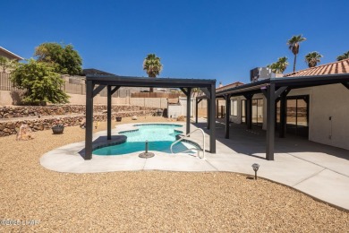 Welcome to your new Lake Havasu retreat! This beautiful on London Bridge Golf Course in Arizona - for sale on GolfHomes.com, golf home, golf lot