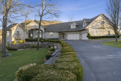 Welcome to your dream home at 119 Silver Oak Way, nestled in the on Ledgestone Country Club and Golf Course in Missouri - for sale on GolfHomes.com, golf home, golf lot