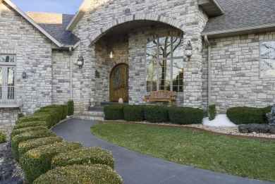 Welcome to your dream home at 119 Silver Oak Way, nestled in the on Ledgestone Country Club and Golf Course in Missouri - for sale on GolfHomes.com, golf home, golf lot