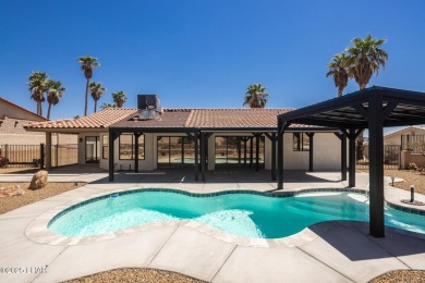 Welcome to your new Lake Havasu retreat! This beautiful on London Bridge Golf Course in Arizona - for sale on GolfHomes.com, golf home, golf lot
