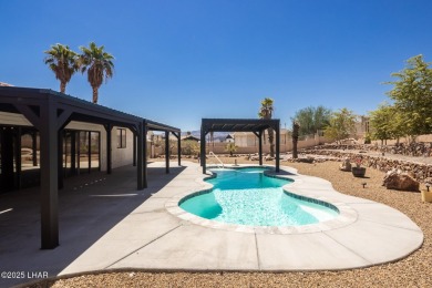 Welcome to your new Lake Havasu retreat! This beautiful on London Bridge Golf Course in Arizona - for sale on GolfHomes.com, golf home, golf lot