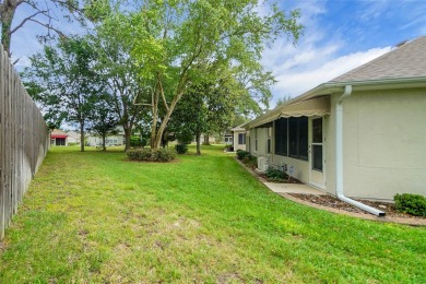 A MUST SEE! This lovely Challedon model BLOCK/STUCCO home in on Eagle Ridge At Spruce Creek Country Club in Florida - for sale on GolfHomes.com, golf home, golf lot