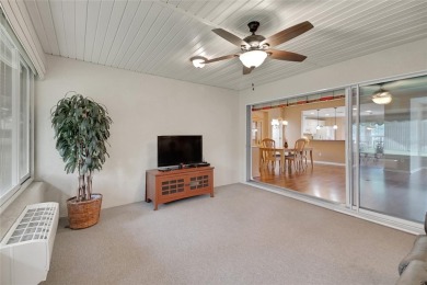 A MUST SEE! This lovely Challedon model BLOCK/STUCCO home in on Eagle Ridge At Spruce Creek Country Club in Florida - for sale on GolfHomes.com, golf home, golf lot