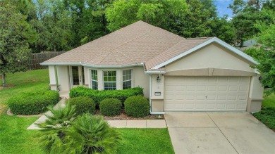 A MUST SEE! This lovely Challedon model BLOCK/STUCCO home in on Eagle Ridge At Spruce Creek Country Club in Florida - for sale on GolfHomes.com, golf home, golf lot