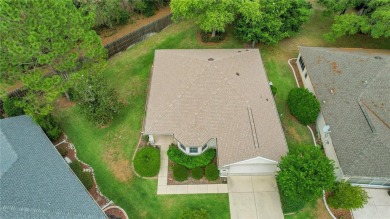 A MUST SEE! This lovely Challedon model BLOCK/STUCCO home in on Eagle Ridge At Spruce Creek Country Club in Florida - for sale on GolfHomes.com, golf home, golf lot