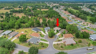 A MUST SEE! This lovely Challedon model BLOCK/STUCCO home in on Eagle Ridge At Spruce Creek Country Club in Florida - for sale on GolfHomes.com, golf home, golf lot