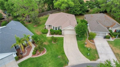 A MUST SEE! This lovely Challedon model BLOCK/STUCCO home in on Eagle Ridge At Spruce Creek Country Club in Florida - for sale on GolfHomes.com, golf home, golf lot