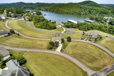 Move-in ready basement ranch with LAKE VIEWS located in serene on Rarity Bay Country Club - Loudon in Tennessee - for sale on GolfHomes.com, golf home, golf lot