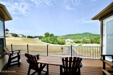 Move-in ready basement ranch with LAKE VIEWS located in serene on Rarity Bay Country Club - Loudon in Tennessee - for sale on GolfHomes.com, golf home, golf lot