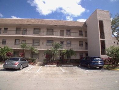 Discover this charming and conveniently located first-floor on Sunrise Lakes Phase IV Golf Course in Florida - for sale on GolfHomes.com, golf home, golf lot