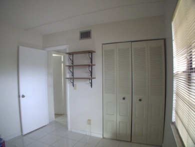 Discover this charming and conveniently located first-floor on Sunrise Lakes Phase IV Golf Course in Florida - for sale on GolfHomes.com, golf home, golf lot